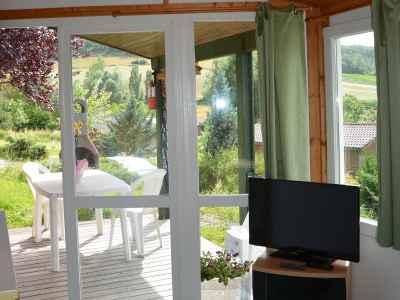 Le salon et terrasse chalet détente